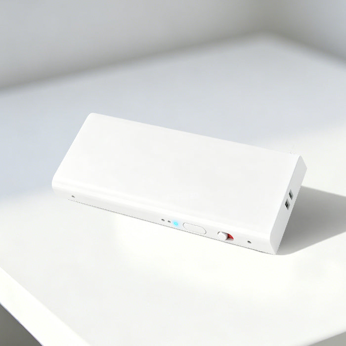 Echo Mini wearable AI note taker on a white desk